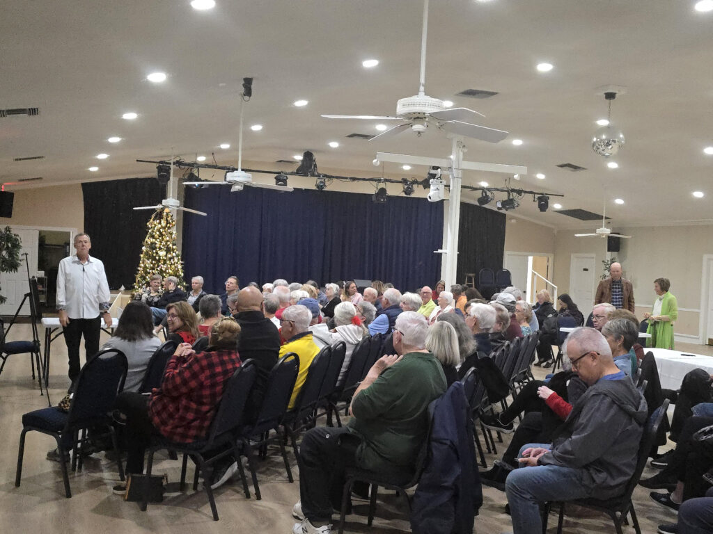 The audience at Night With a Novelist listening to the inspiration for The Eagle Scout Picture, a riveting WWII spy novel